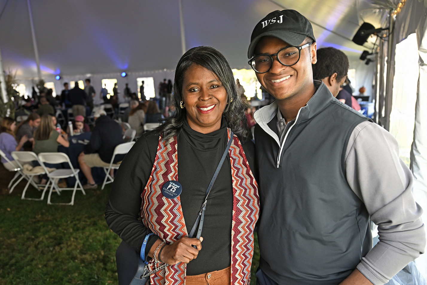 Parents in the picnic tent at Fall Weekend