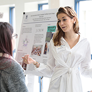 A Student Presents at the College Symposium