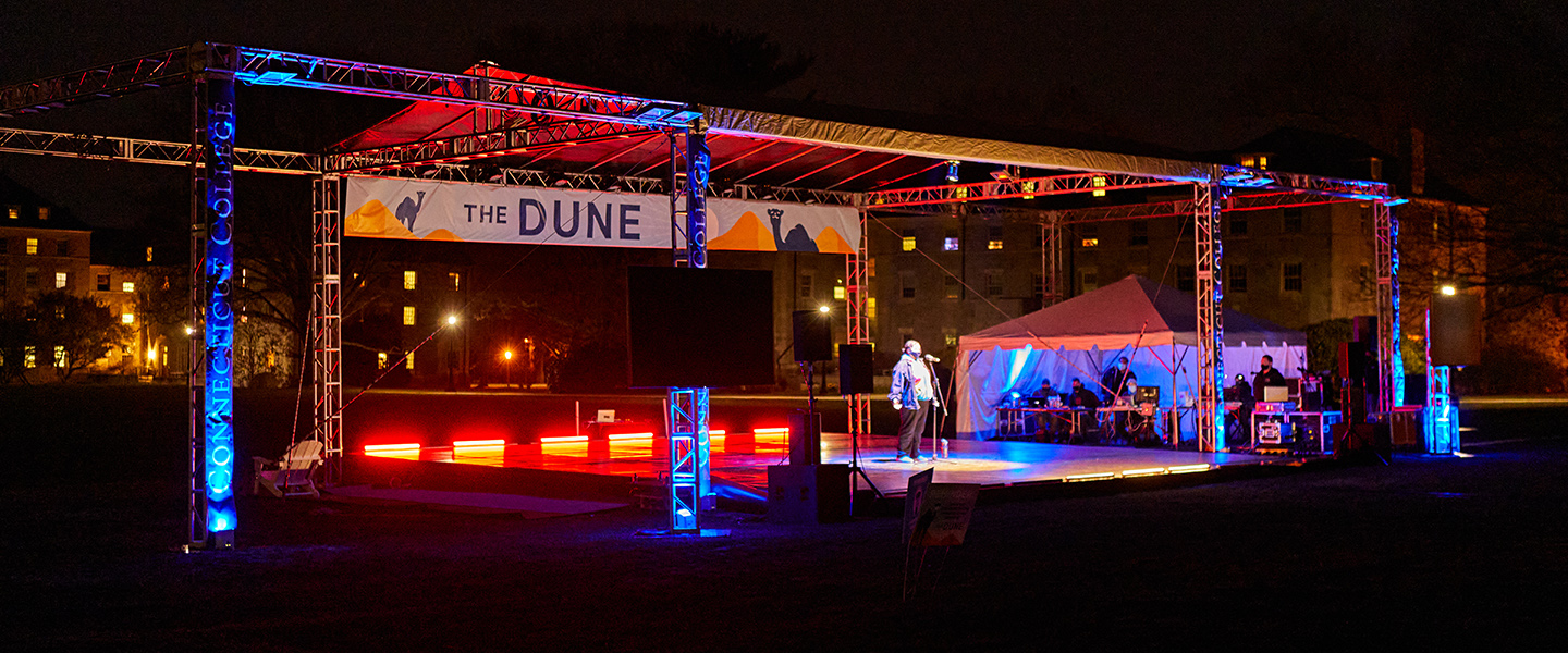 A student sings during the Eclipse show on The Dune. 